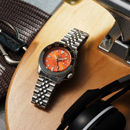 Seiko 5 Sports Automatic GMT Watch – Orange Dial with Black & Gold Bezel